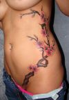 cherry blossom branch tattoo for girl
